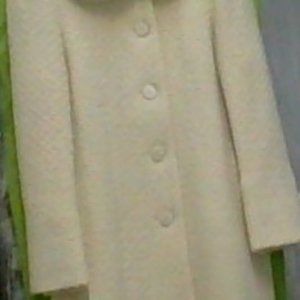 Full length cream coat with real fur collar